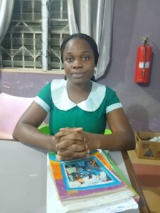 Madam Veronica Abrokwah, a 30-year-old nurse turned tomato farmer and processor, living in Akumadan, Ghana.
