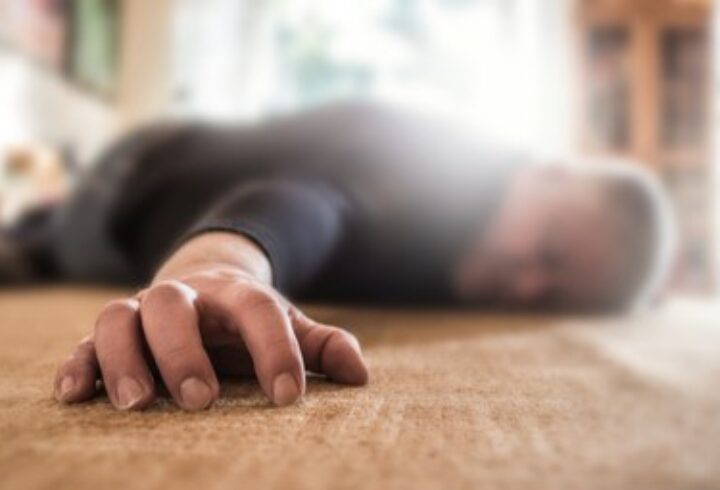 man-lies-unconscious-his-apartment-260nw-1033456060
