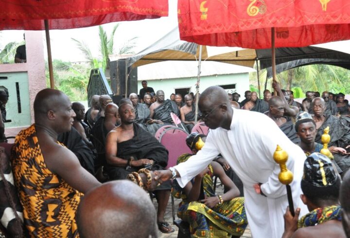 The late priest Rev. Fr. Stephen Boaheng exchanging pleasantry with Akokofehene, Nana Osako Adu Panin