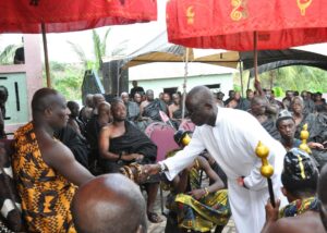 The late priest Rev. Fr. Stephen Boaheng exchanging pleasantry with Akokofehene, Nana Osako Adu Panin